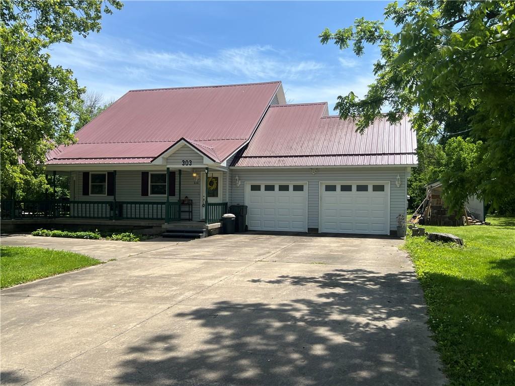 303 High Street, Golden City, MO 64748