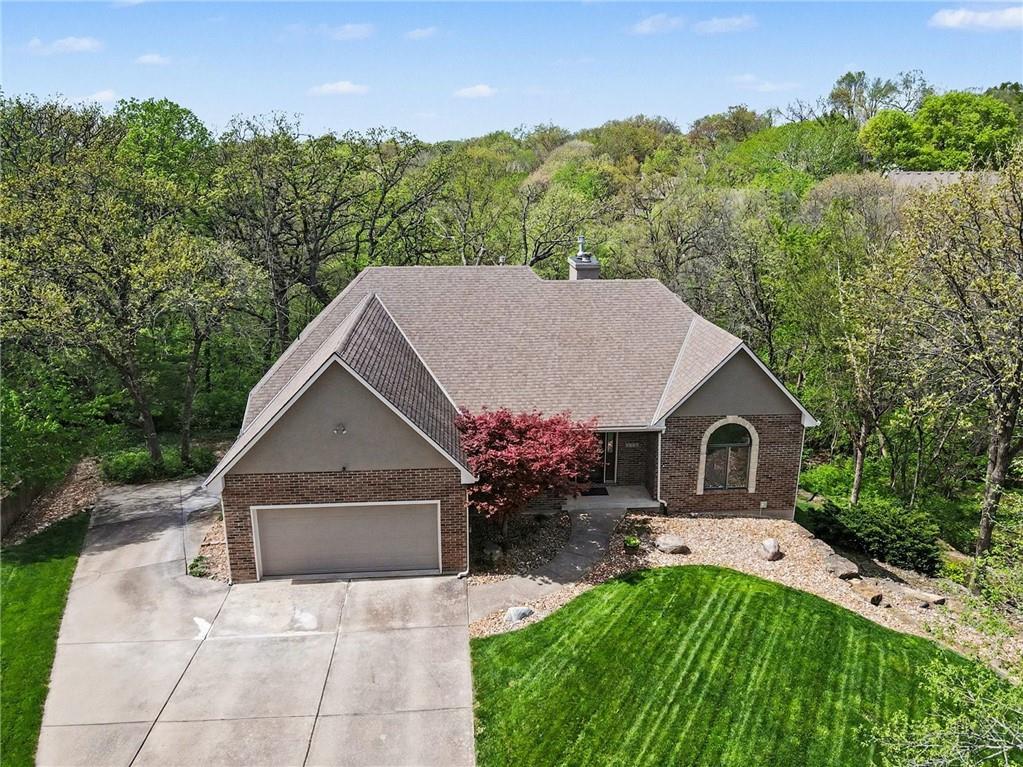 2401 SW Whispering Creek Court, Blue Springs, MO 64015